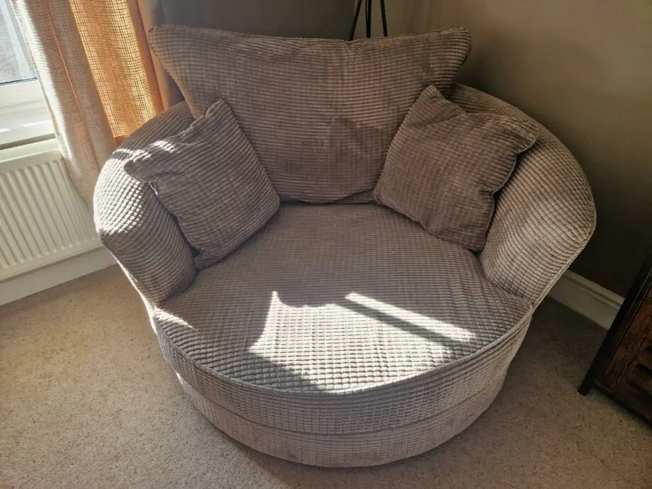 4 seater sofa, swivel chair and foot stool