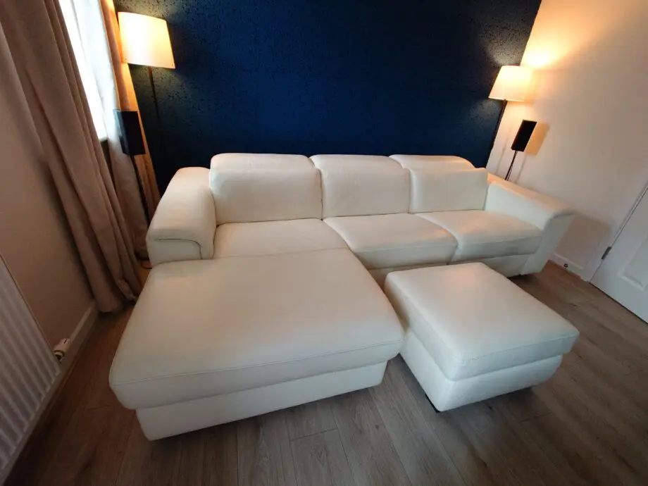 White Leather Nicoletti Italian 4 seat sofa with chaise long and powered recliner