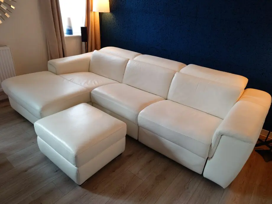 White Leather Nicoletti Italian 4 seat sofa with chaise long and powered recliner