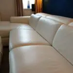 White Leather Nicoletti Italian 4 seat sofa with chaise long and powered recliner