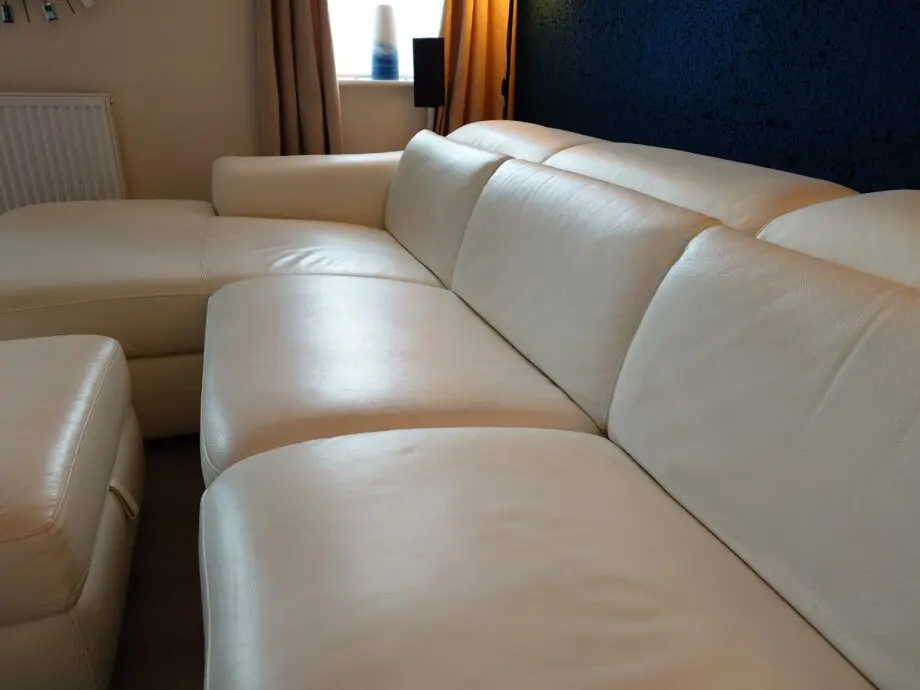 White Leather Nicoletti Italian 4 seat sofa with chaise long and powered recliner
