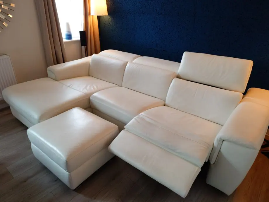 White Leather Nicoletti Italian 4 seat sofa with chaise long and powered recliner