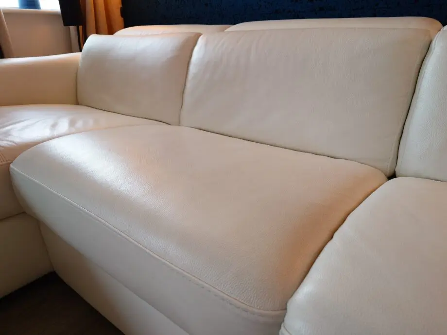 White Leather Nicoletti Italian 4 seat sofa with chaise long and powered recliner