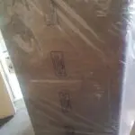 Brand new light grey 2 seater sofa from The Furnishing Shop (TFS)