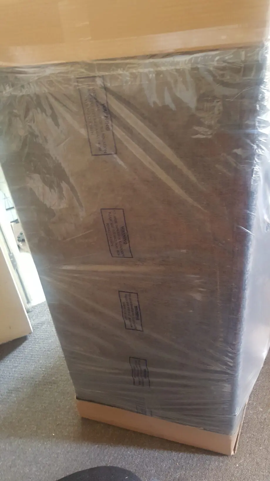 Brand new light grey 2 seater sofa from The Furnishing Shop (TFS)