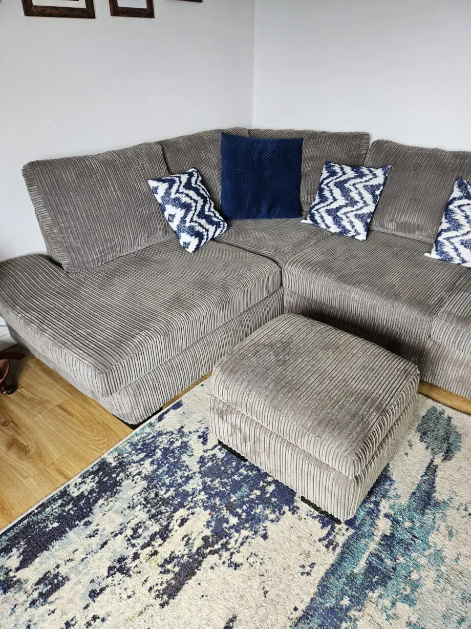 DFS grey corner sofa and pouffe