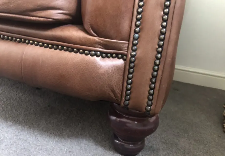 Distinctive Chesterfield 2 cushion Tan Sofa