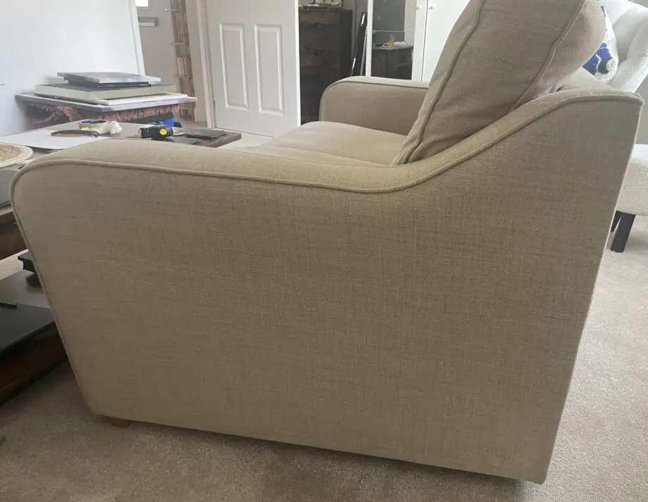 Beige two seater sofa