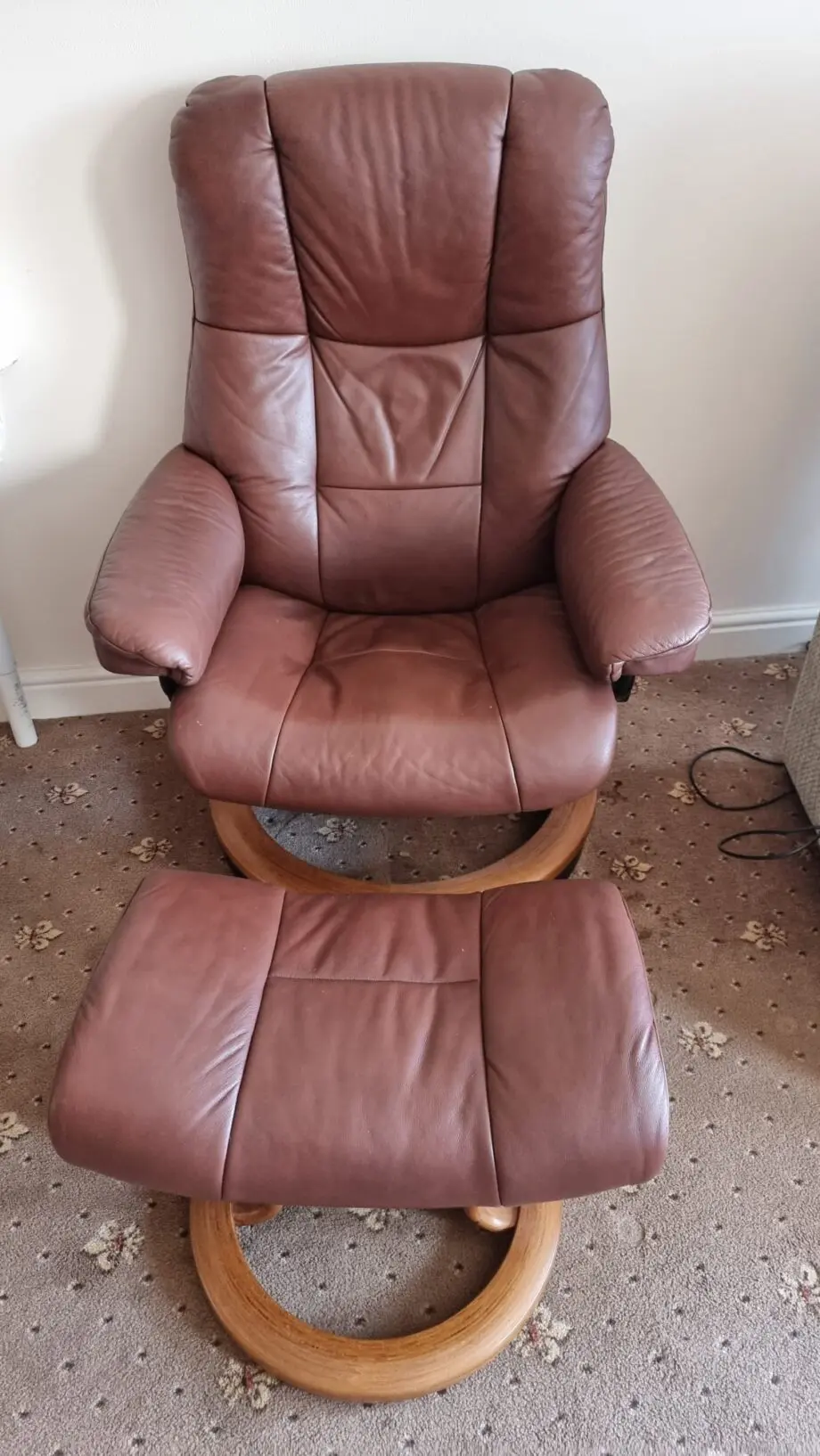 Parker Knoll brown leather chair and footstool