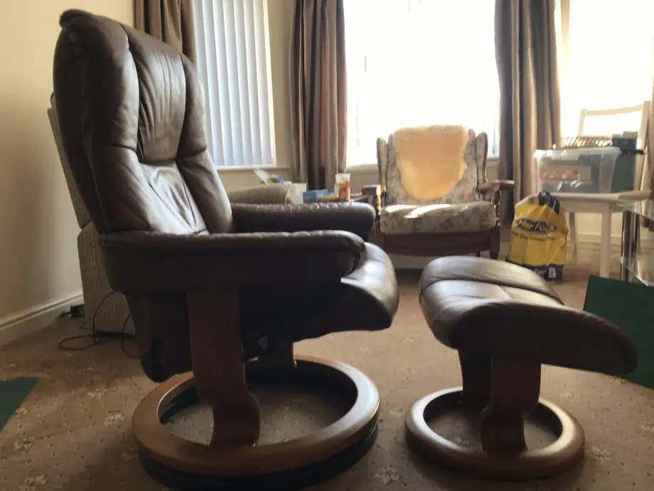 Parker Knoll brown leather chair and footstool
