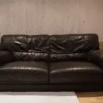 Two seater brown sofa