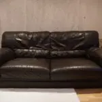 Two seater brown sofa
