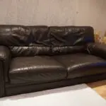 Two seater brown sofa