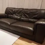 Two seater brown sofa
