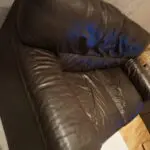 Two seater brown sofa