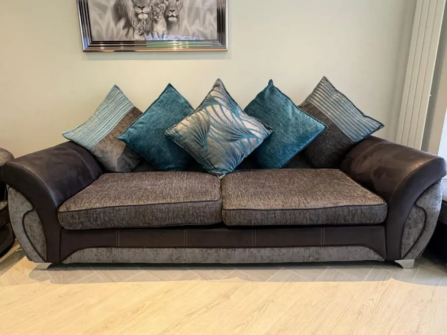 DFS grey 4 seater with cuddler and footstool