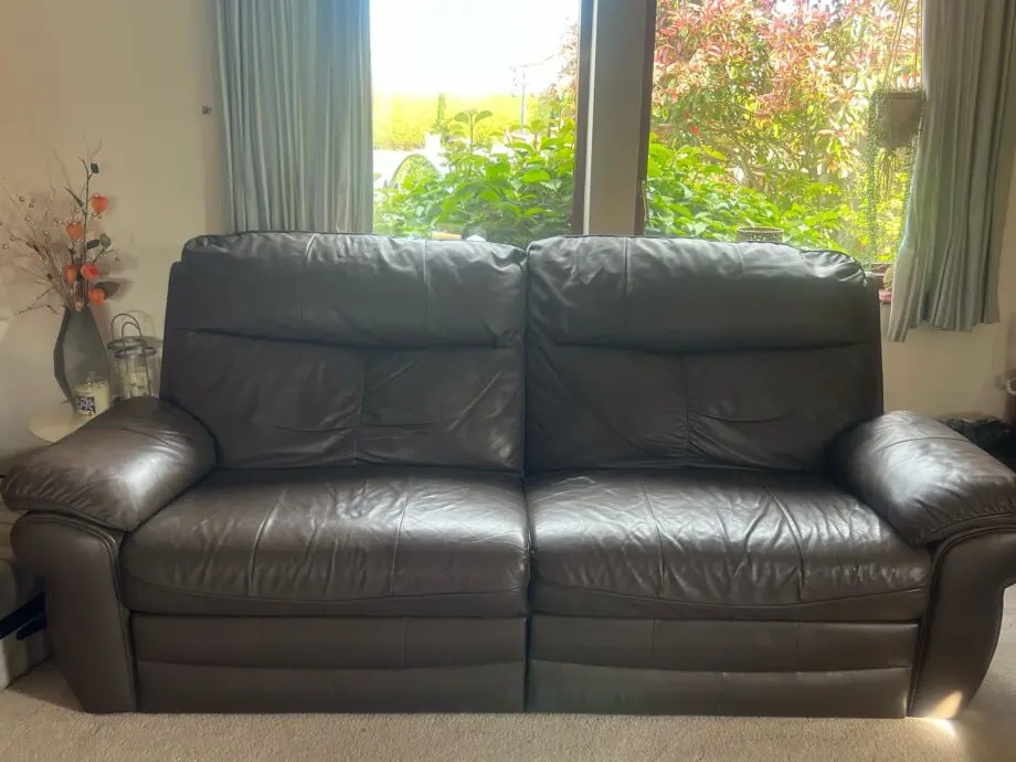 One 3 Seater, recliner and one 2 seater SCS leather sofas-- Dark Brown colour. Unused for 5 years