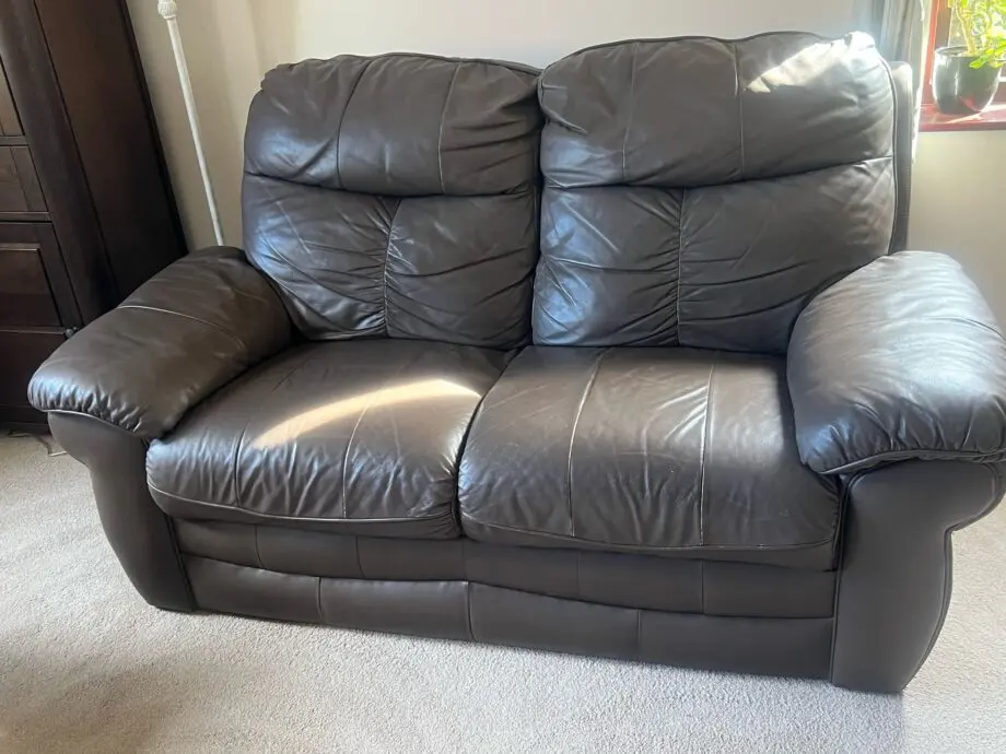 One 3 Seater, recliner and one 2 seater SCS leather sofas-- Dark Brown colour. Unused for 5 years