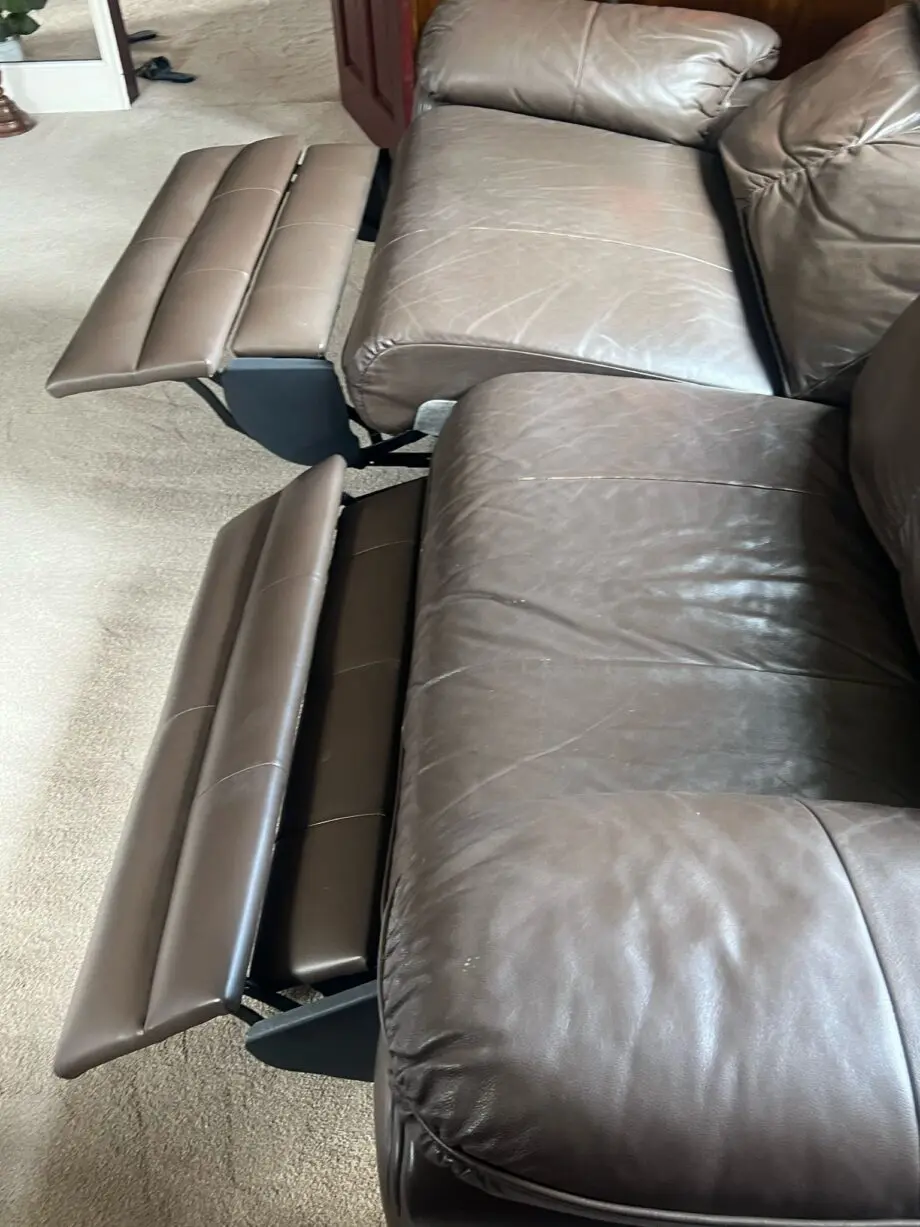 One 3 Seater, recliner and one 2 seater SCS leather sofas-- Dark Brown colour. Unused for 5 years