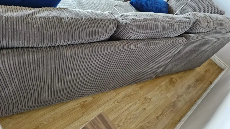 DFS grey corner sofa and pouffe