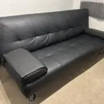 3 seater black faux leather click clack sofa bed