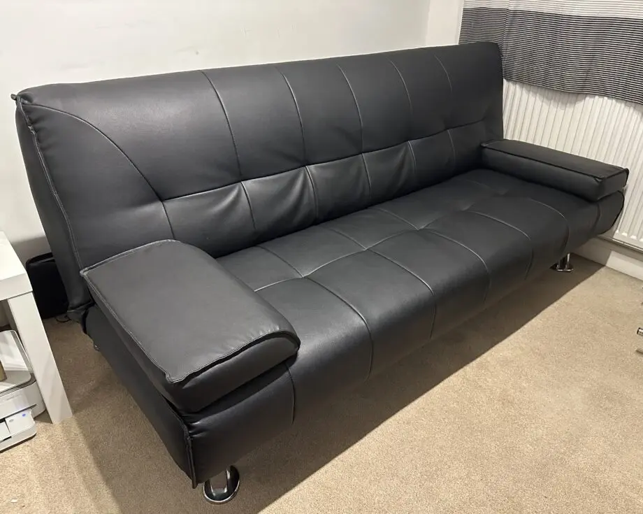 3 seater black faux leather click clack sofa bed