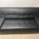 3 seater black faux leather click clack sofa bed