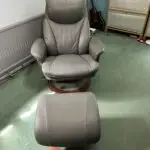 Lazboy Grey leather swivel recliner chairs and foot stools
