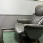 Lazboy Grey leather swivel recliner chairs and foot stools