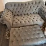 Grey velour Chesterfield 2/3 seater sofa and puffa