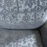 Deep blue sofa bed with footstool
