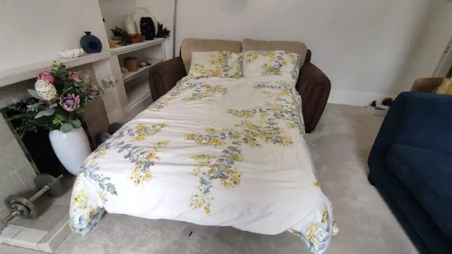 Beige 2/3 seater sofa bed