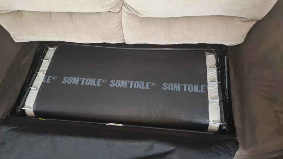 Beige 2/3 seater sofa bed