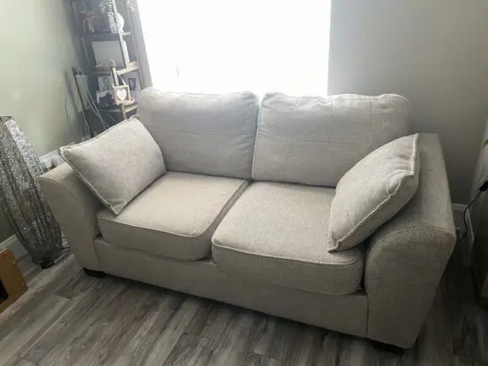 DFS 2 seater sofa bed and foot stool