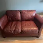 Large 2 seater red leather Lazy Boy, used but good condition
