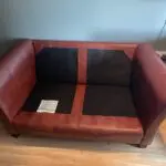 Large 2 seater red leather Lazy Boy, used but good condition