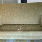 Vale / Bridgecraft 3 seater sofa in green fabric. Cushions are floral pattern.