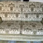 Vale / Bridgecraft 3 seater sofa in green fabric. Cushions are floral pattern.