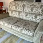 Vale / Bridgecraft 3 seater sofa in green fabric. Cushions are floral pattern.