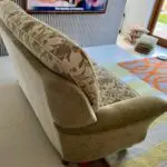 Vale / Bridgecraft 3 seater sofa in green fabric. Cushions are floral pattern.