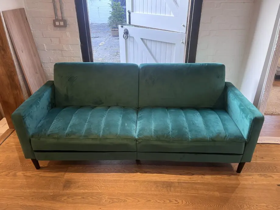 Great 2/3 sofa bed in dark green