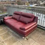 3 seat red sofa