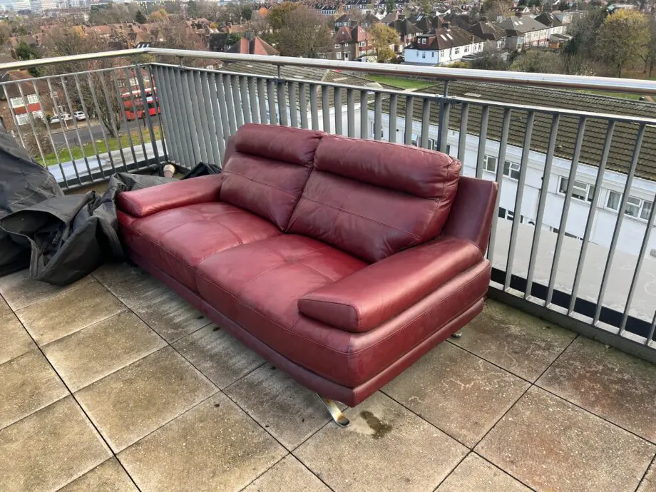 3 seat red sofa
