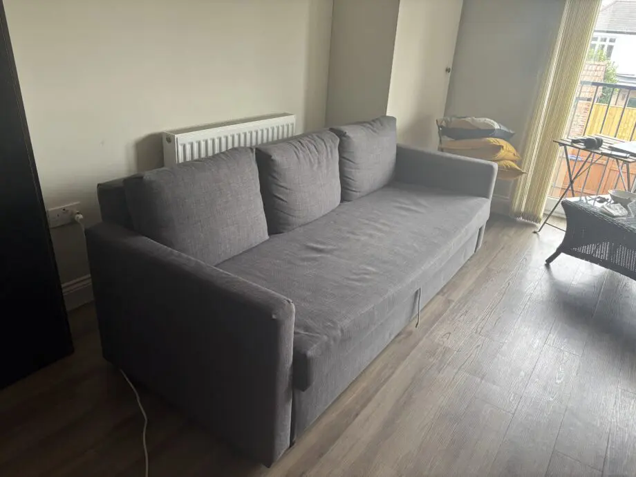 IKEA FRIHETEN Three-seat sofa-bed, Skiftebo dark grey