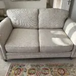 DFS speckled oatmeal 2 seater sofa