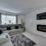 DFS Grey corner sofa with reclining hairs