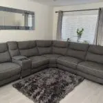 DFS Grey corner sofa with reclining hairs