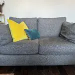 Grey upholstered 2 seater sofa