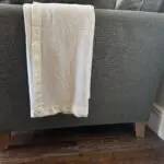Grey upholstered 2 seater sofa