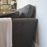Grey upholstered 2 seater sofa